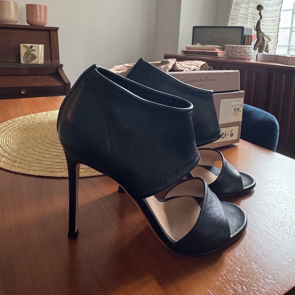 Only worn a few times. Great condition, with box and travel bags.